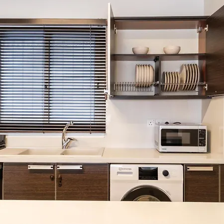 Alpha Court Apartment